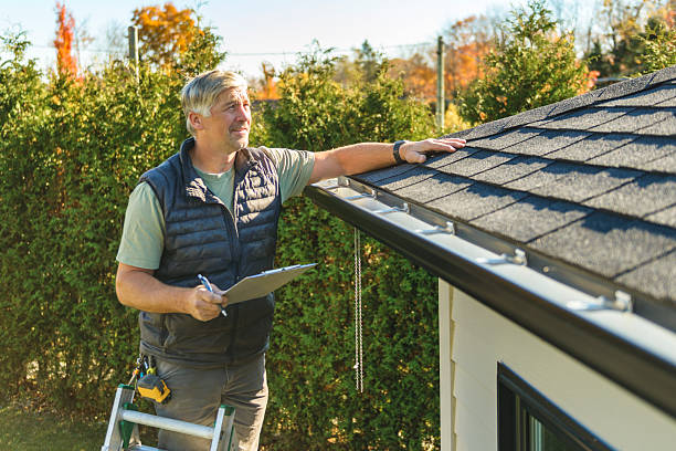 Professional Hail Damage Roof Repair technician working in Woodstock, AL